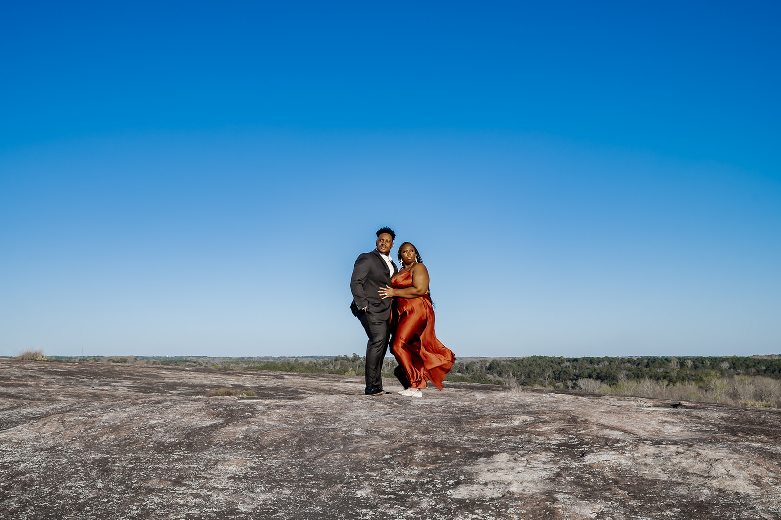 Latisha and Marion recently had the photoshoot of a lifetime at Arabia Mountain. Capturing the beauty of this stunning one-of-a-kind park, they posed for romantic shots under the vast sky, waltzed through splendid nature trails, and enjoyed each other's company in the most breathtaking setting.