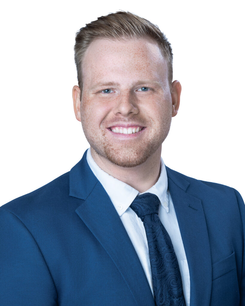 Business Headshot of a FISERV employee with a pure white background. Headshot captured by PWG Lens Photography