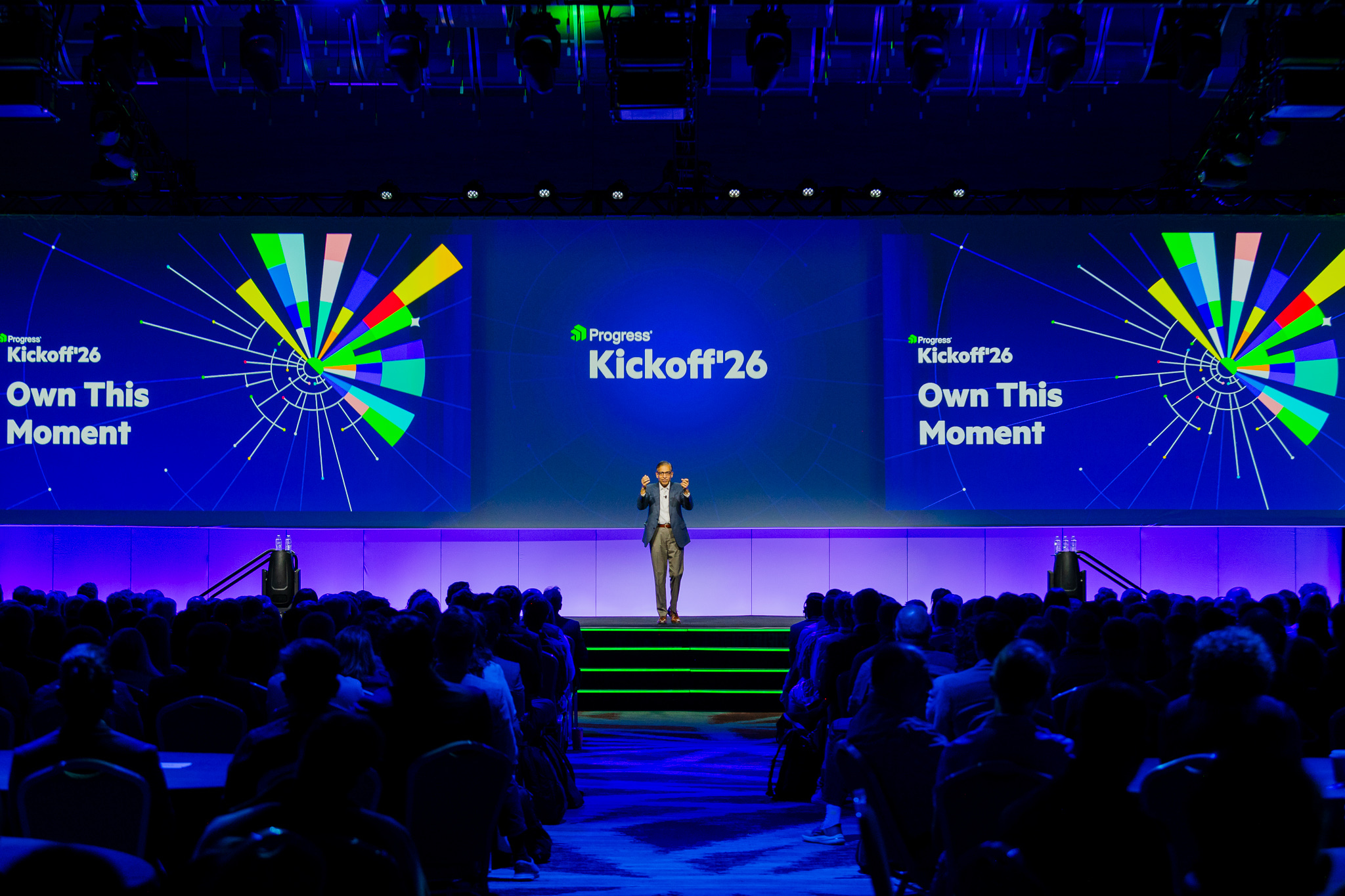 Professional conference photography capturing a keynote speaker on stage at an Atlanta corporate event.