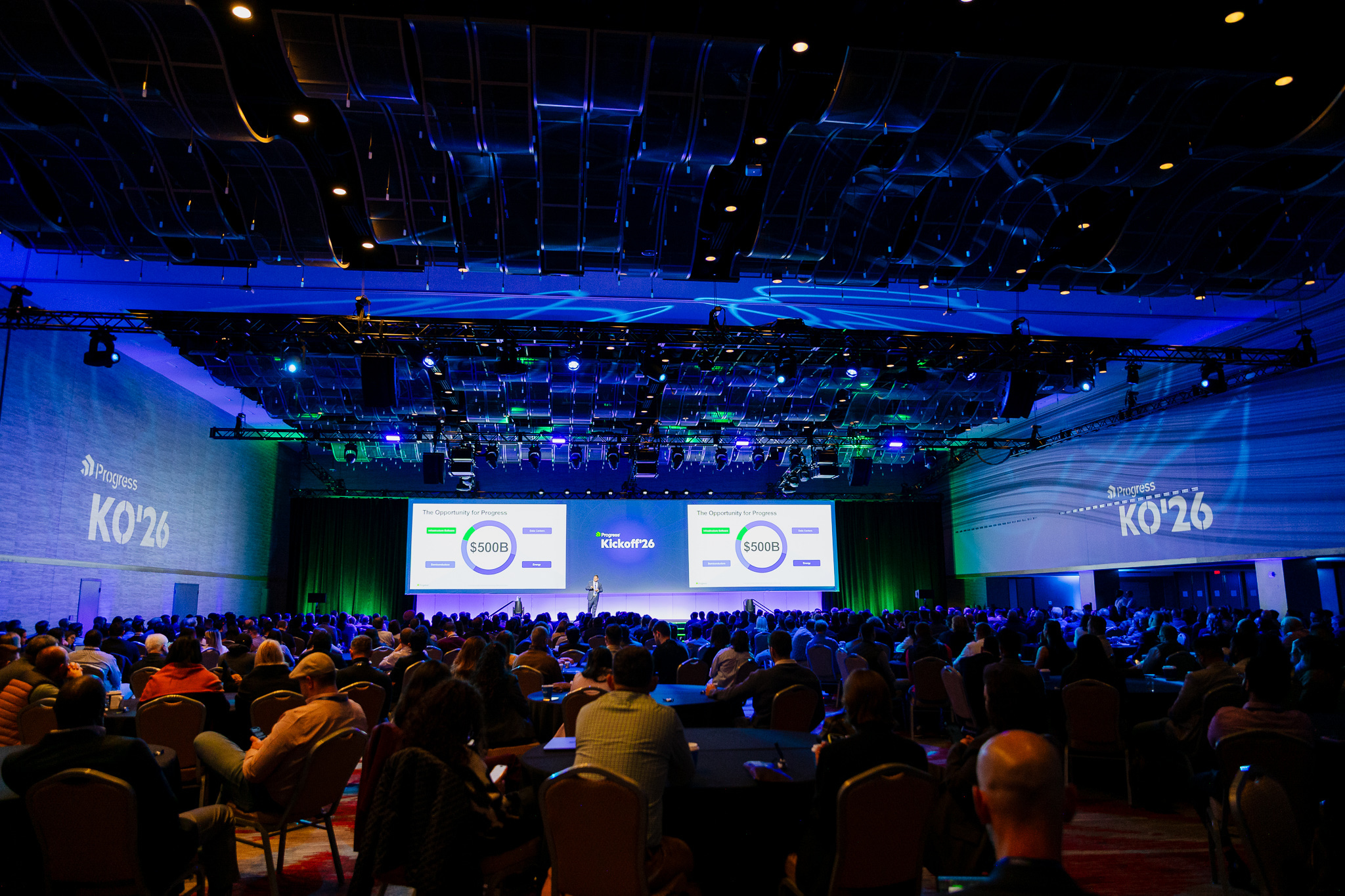 Corporate event photography capturing a keynote presentation at an Atlanta conference hotel.